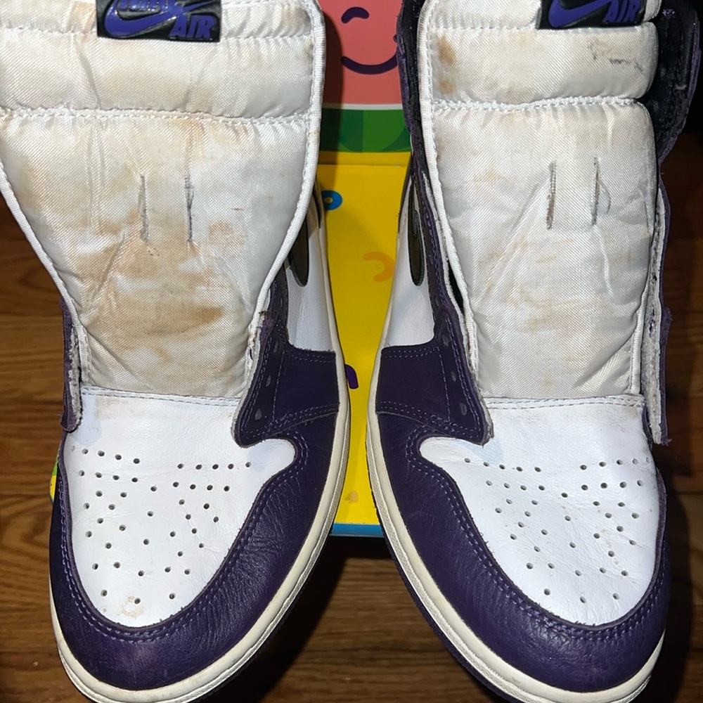 Purple and white Jordan 1s